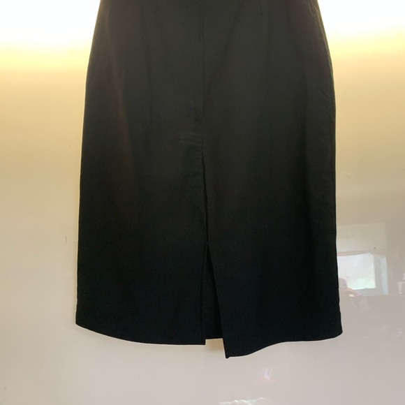 Black dressy skirt with belt loops. Small slit in back - Picture 5 of 5